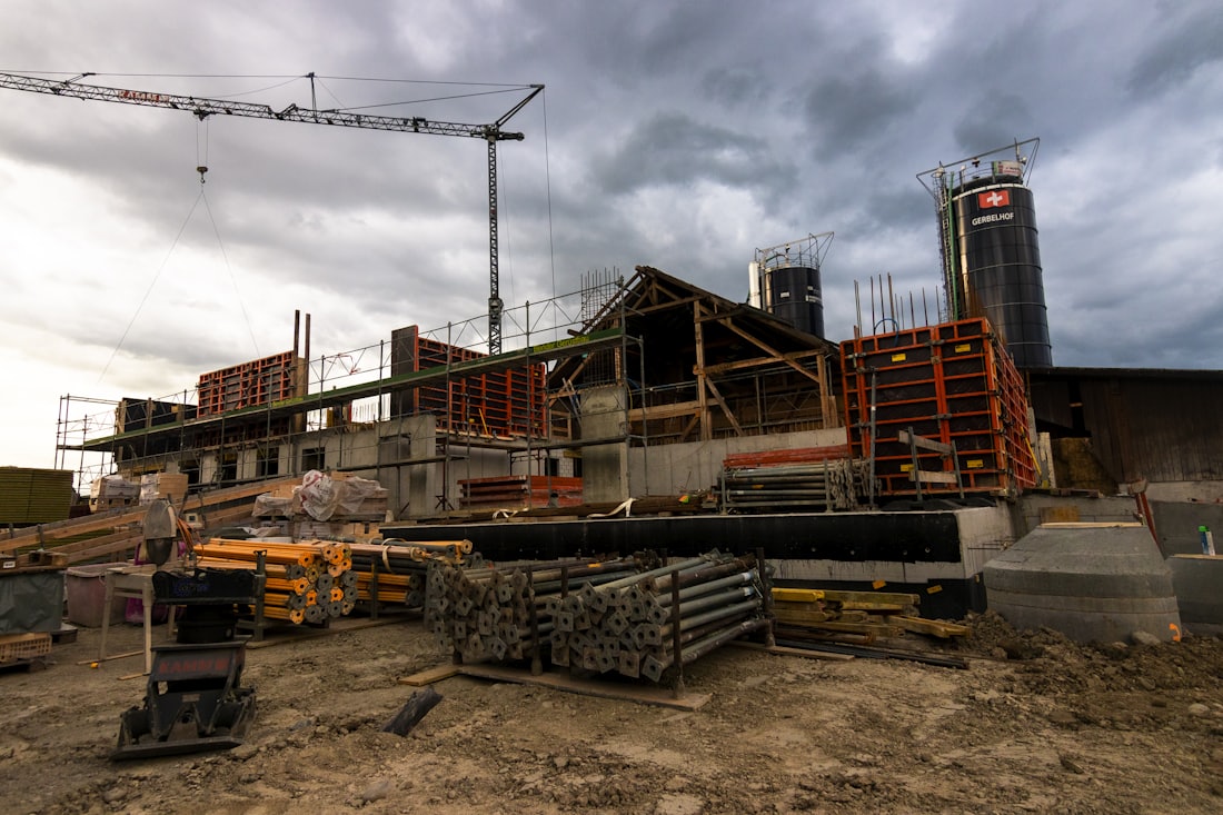 A development site under construction with tower cranes