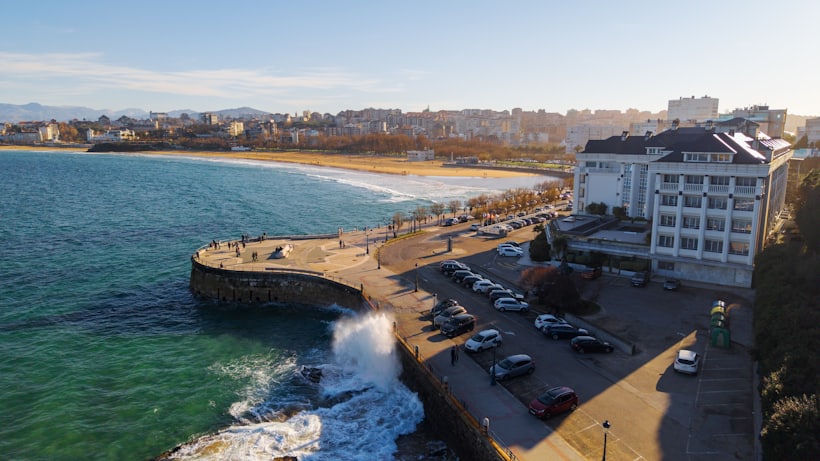 A seafront apartment building above a promenade