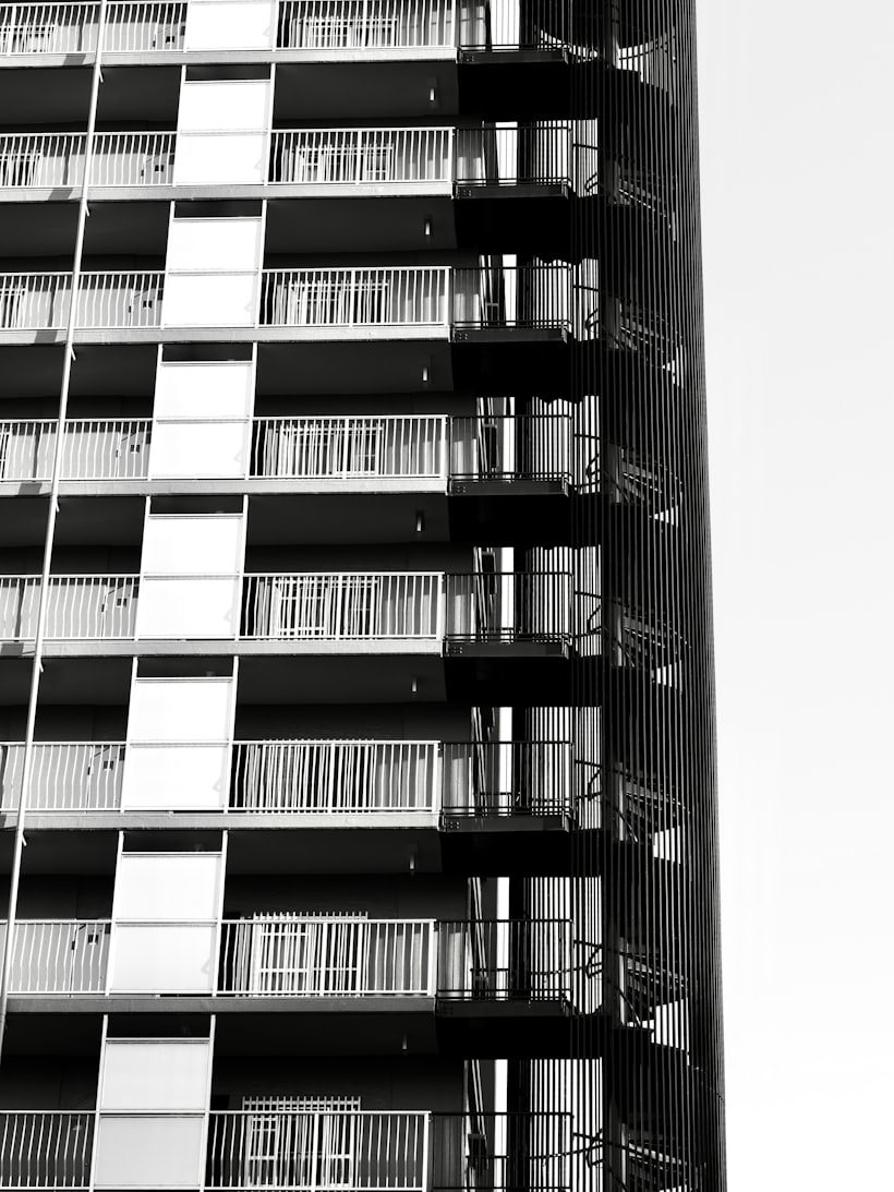 A modernist apartment block with stacked balconies